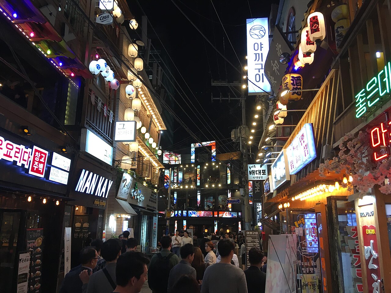 Street lights and storefronts in Seomyeon, Busan, at night