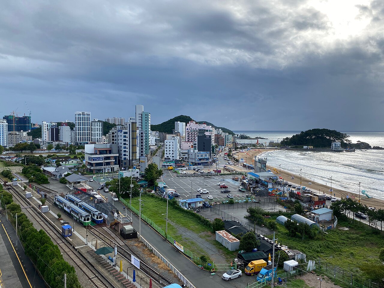 Beach Train carriages and the shoreline at Songjeong in Busan