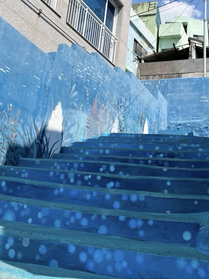 Blue painted stairway at Huinnyeoul Culture Village